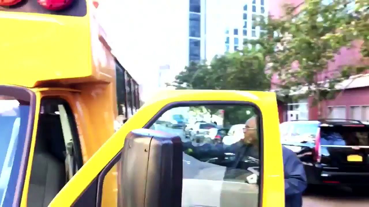 Bus Driver Holds Hurt Child as He’s Carried Into Ambulance Following NYC Attack