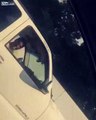 Crazy guy jumps out of a moving SUV