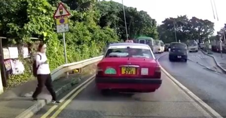 Clumsy Lady Has A Close Brush With Death