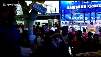 Mumbai man rides horse in ceremonial procession to buy iPhone X