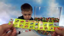 Игрушки сюрпризы в разноцветных конфетах в виде шариков a lot of Candy with surprise toys unboxing