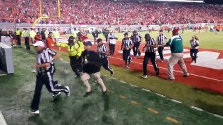 Crazy NC State fans throwing objects and spitting on refs!