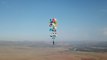 Man Flies Over South Africa Strapped To Lawn Chair With 100 Balloons