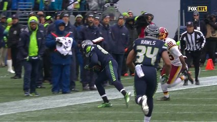 Baldwin somehow gets both feet down for 20-yard sideline grab