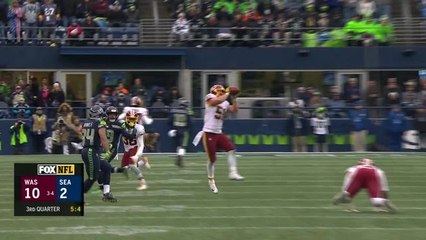 Will Compton intercepts Russell Wilson in the middle of the field
