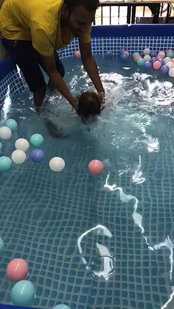 ⁣buddy learning to swim. So cute