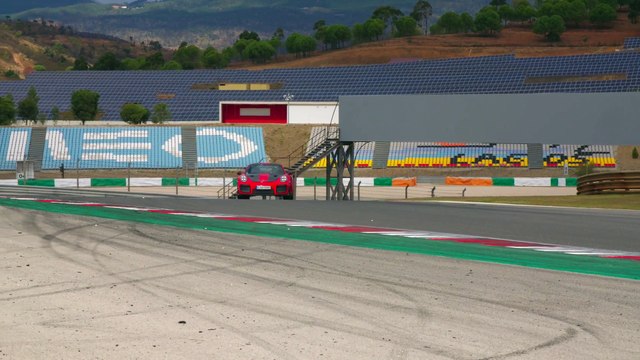 Porsche 911 GT2 RS in Guards Red Driving on the track