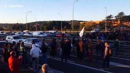 Protesters block major highway in Catalonia