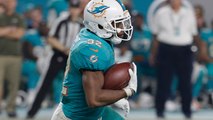 Kenyan Drake's stiff arm sets up 42-yard gain