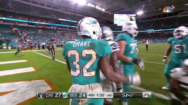 Miami Dolphins RB Kenyan Drake pushes the pile forward for two-point conversion
