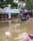 Tourists Navigate Flooded Hoi An via Kayak