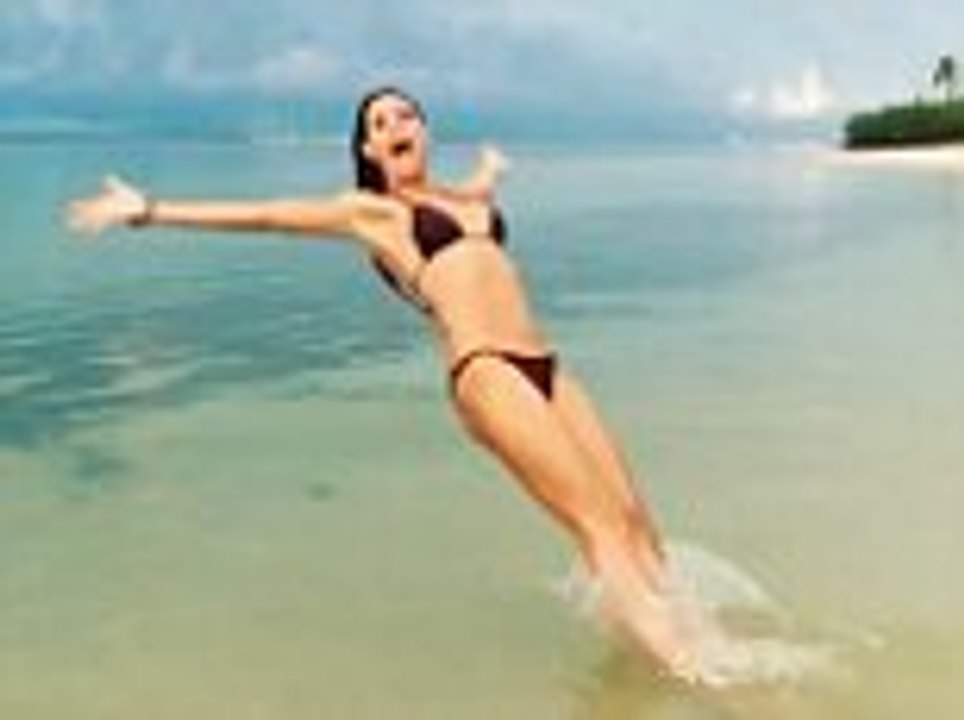 Heidi Klum frolics into the Caribbean on vacation from ANTM