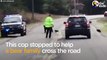 Cop Helps Bear Family Cross The Road