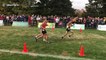 State cross-country runner helps competitor over the line