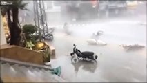 People Abandon Their Scooters To Escape Storm.