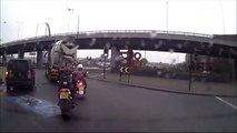 UK driver complaining about dangerous roundabout hits biker