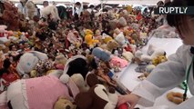 Em Tóquio, bonecas são enterradas em ritual
