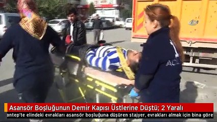 Asansör Boşluğunun Demir Kapısı Üstlerine Düştü: 2 Yaralı