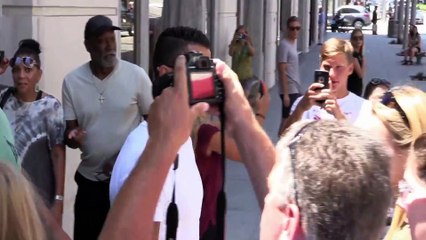 Pushes A Young Fan While Shopping On Rodeo Drive