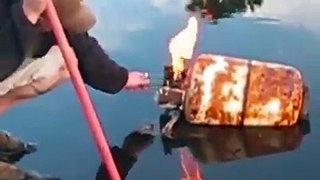 Blasting a cylinder on water
