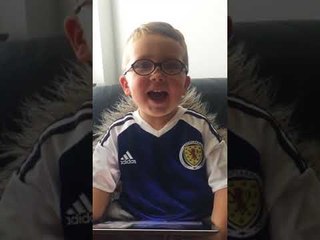 'Batman Boy' Watches Himself on YouTube