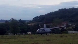 helicopter crashes after colliding with electricity cables