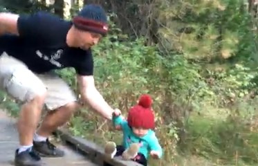 Guy Shows Off Impressive Dad Reflexes To Save His Kid From Falling In A Pond