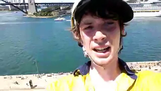 Manus Island Protesters Film Themselves Atop of Opera House Sails