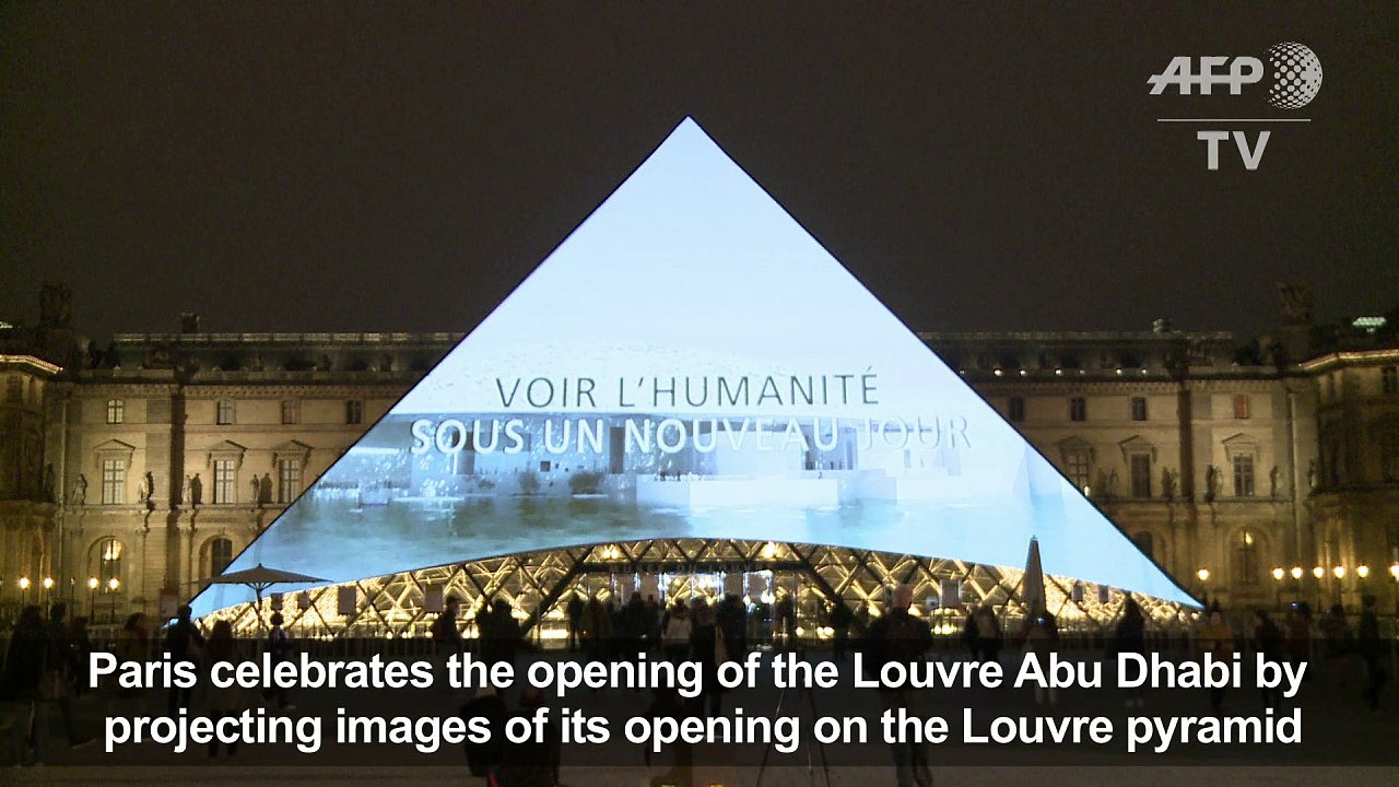 Images adorn Paris Louvre Pryamid as Abu Dhabi...