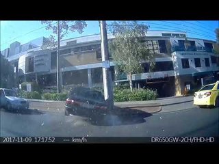 Elderly Driver Loses Control of Car, Smashing Into Parked Vehicle and Hospital Building