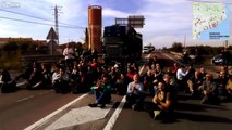 Spanish Regime Police move Catalan protesters from blocked roads