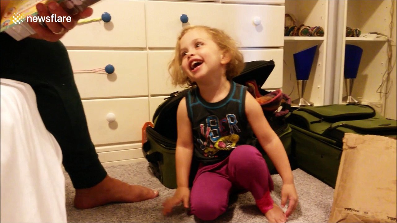 Three-year-old is super excited about present