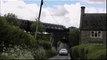 Steam Engine Pulling a Train of 6 Coaches over a Bridge in the UK