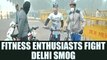 Delhi Air Pollution : Fitness enthusiasts remained undeterred by thick smog | Oneindia News