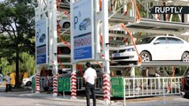 A Ferris Wheel for Cars? Check Out This Vertical Rotating Parking Lot