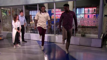 Alex Collins teaches Nate Burleson how to Irish dance