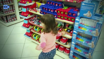 Baby Mizneh buying toys