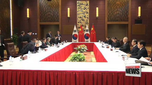 Moon, Xi hold summit talks, agree to normalize all relations; Third bilateral set for Dec. in China