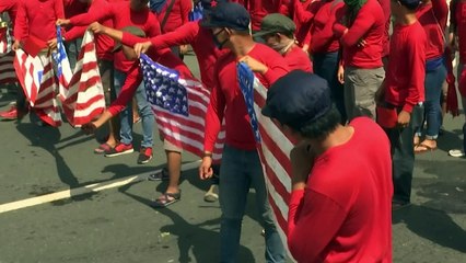People burn US flag in Philippines protests