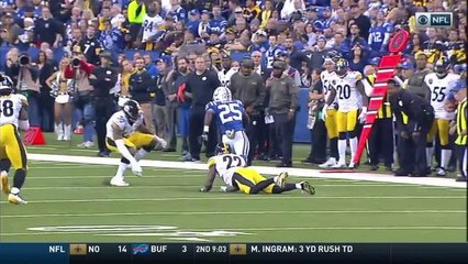 Marlon Mack pushes through arm tackles to pick up first down