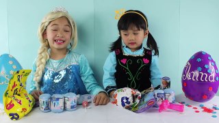 Real Elsa and Anna opening FROZEN EGG SURPRISE