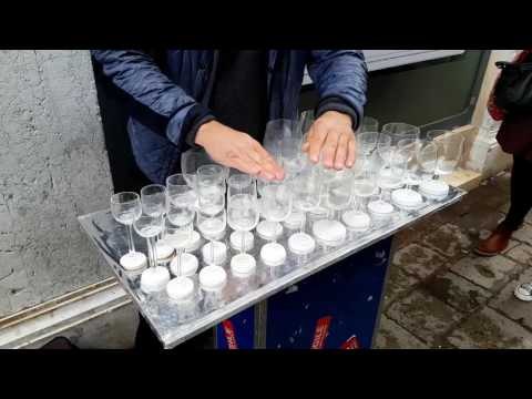 Street Performer Plays Harry Potter's Theme Song on Glass Harp