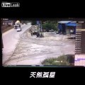 Motorcyclists gets ran over by a cement truck
