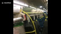 Southern Rail commuter uses train ceiling grate as bottle opener