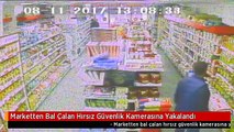 Marketten Bal Çalan Hırsız Güvenlik Kamerasına Yakalandı