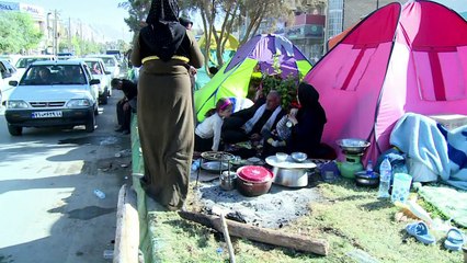 Iranians dig out after massive quake