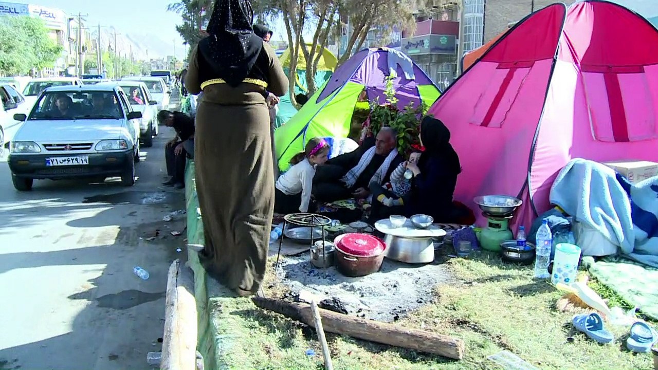 Iranians dig out after massive quake