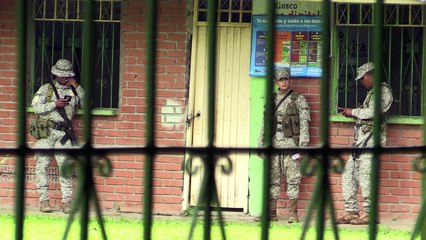 Colombians live in fear as rebels fight over cocaine-rich land