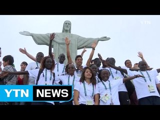 '희망 배달부' 난민팀, 리우 예수상서 활짝 / YTN (Yes! Top News)