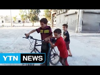 포화 속에도 피어나는 '아이들의 웃음' / YTN (Yes! Top News)